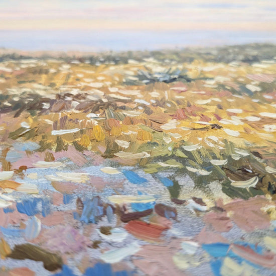 The image is an impressionist painting depicting a field with a mix of warm and cool colors, including yellow, green, blue, and brown. The brushstrokes are loose and visible, creating a sense of movement and energy in the scene.