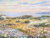 The image is a vibrant impressionist painting depicting a field of wildflowers with a serene body of water in the background.